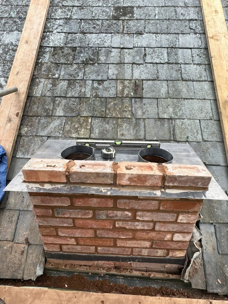 New leadwork surrounding chimney